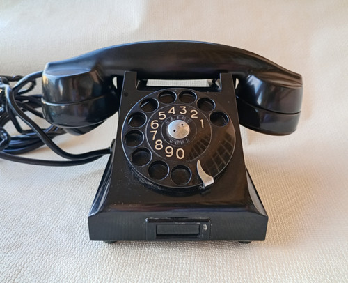 Telefono disco vintage in - telefono, a