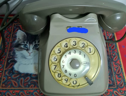 Telefono grigio disco - telefono, a